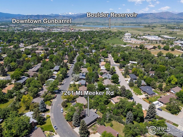 7261 Mount Meeker Rd, Longmont, CO 80503 - aerial perspective of suburban area featuring a water and mountain view