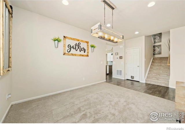 6504 Zimmerman Lake Rd, Timnath, CO 80547 - carpeted empty room with recessed lighting and stairs