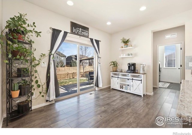 6504 Zimmerman Lake Rd, Timnath, CO 80547 - dining area with dark wood finished floors and recessed lighting