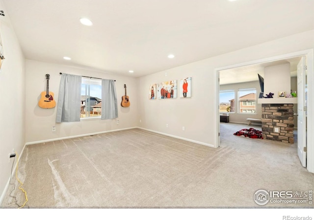 6504 Zimmerman Lake Rd, Timnath, CO 80547 - carpeted empty room featuring baseboards and recessed lighting