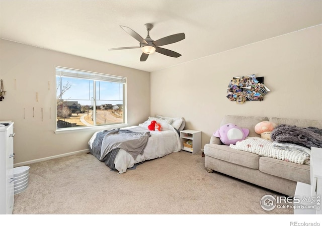 6504 Zimmerman Lake Rd, Timnath, CO 80547 - carpeted bedroom with baseboards and a ceiling fan