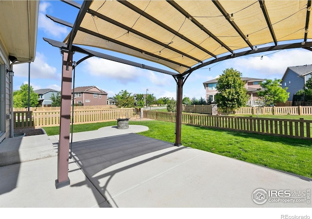 6504 Zimmerman Lake Rd, Timnath, CO 80547 - fenced backyard featuring a patio and a residential view