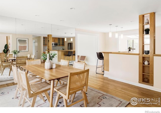 2085 Alpine Dr, Boulder, CO 80304 - dining space with light wood-style flooring and recessed lighting