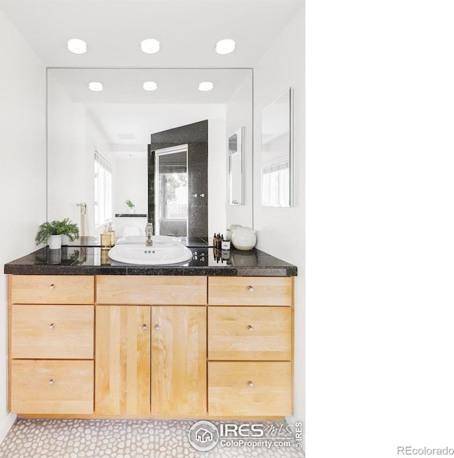 2085 Alpine Dr, Boulder, CO 80304 - bathroom featuring vanity and recessed lighting