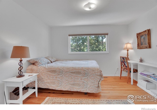 1590 Findlay Way, Boulder, CO 80305 - bedroom with wood finished floors and baseboards
