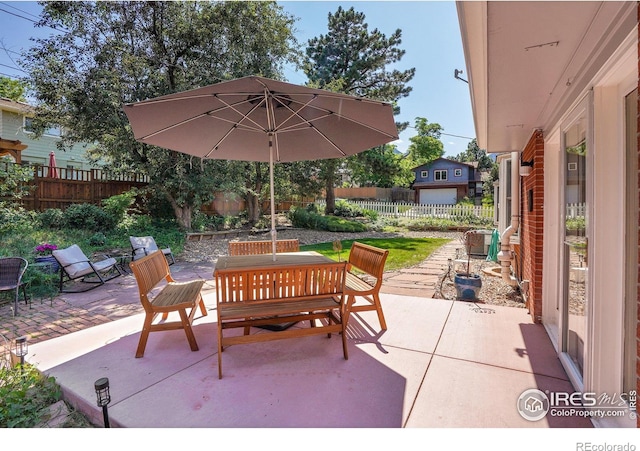 1590 Findlay Way, Boulder, CO 80305 - fenced backyard featuring outdoor dining area and a patio area