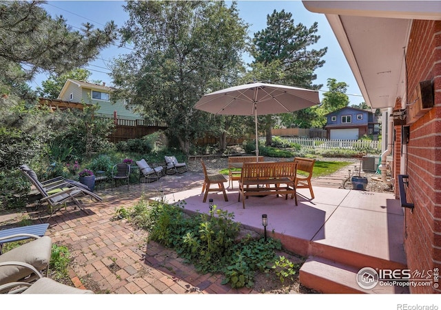 1590 Findlay Way, Boulder, CO 80305 - fenced backyard featuring a patio