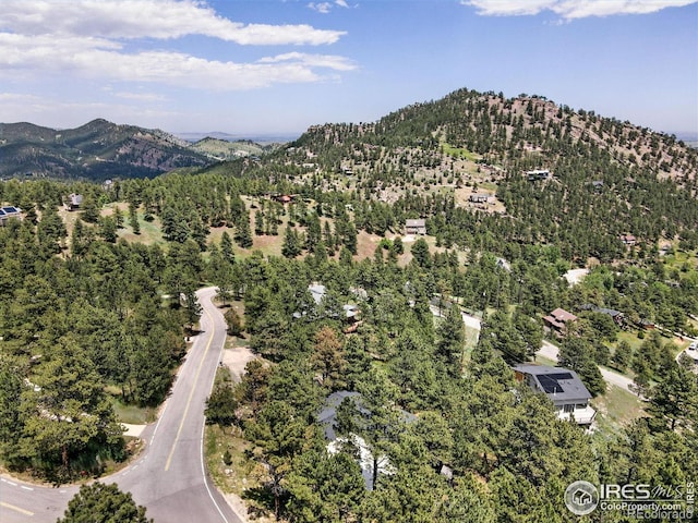2433 Linden Dr, Boulder, CO 80304 - aerial view of property and surrounding area with a mountainous background and a forest