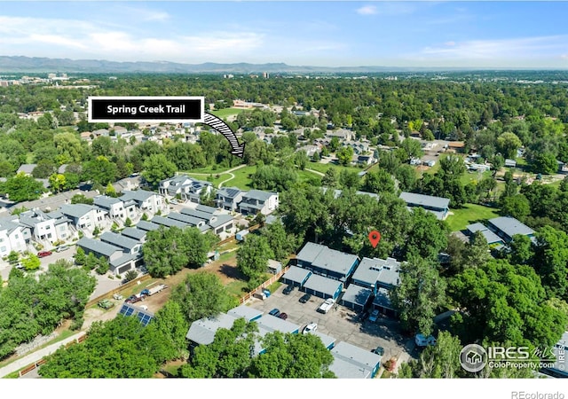 1731 Springmeadows Ct Unit A, Fort Collins, CO 80525 - aerial view of residential area featuring a forest and a mountainous background