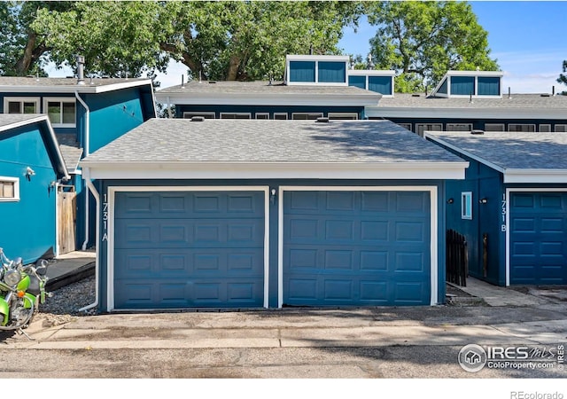 1731 Springmeadows Ct Unit A, Fort Collins, CO 80525 - view of front facade with a shingled roof