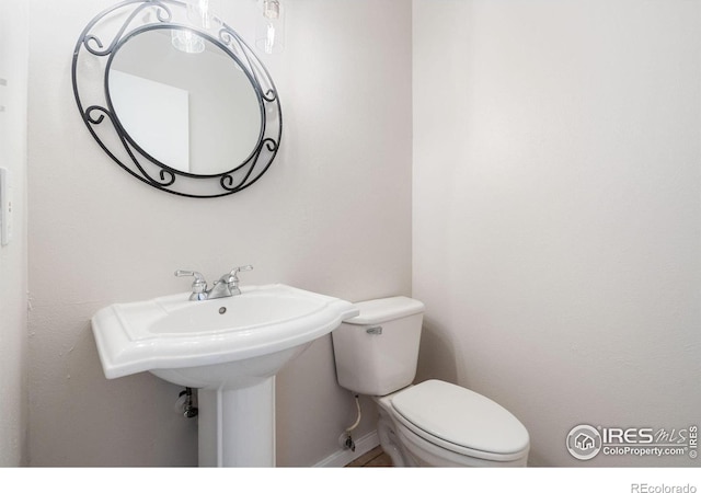 1731 Springmeadows Ct Unit A, Fort Collins, CO 80525 - half bathroom with toilet and baseboards
