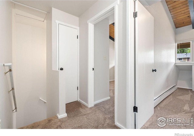 1731 Springmeadows Ct Unit A, Fort Collins, CO 80525 - hall featuring baseboard heating, carpet flooring, wood ceiling, and vaulted ceiling