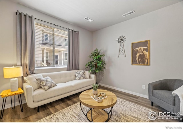 620 Apache Trl Unit 2, Ault, CO 80610 - living room with baseboards and wood finished floors