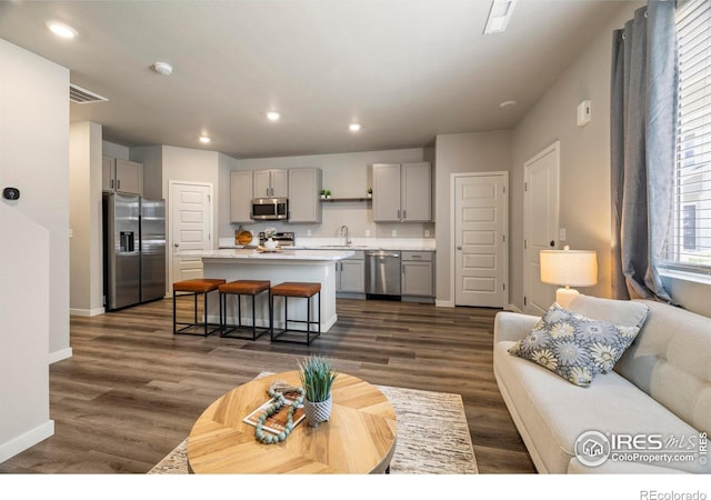 620 Apache Trl Unit 2, Ault, CO 80610 - living room with recessed lighting and dark wood-type flooring