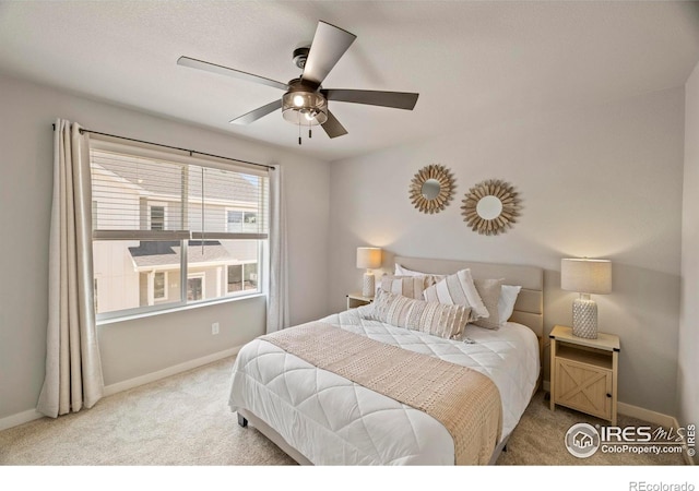 620 Apache Trl Unit 2, Ault, CO 80610 - carpeted bedroom featuring baseboards and ceiling fan
