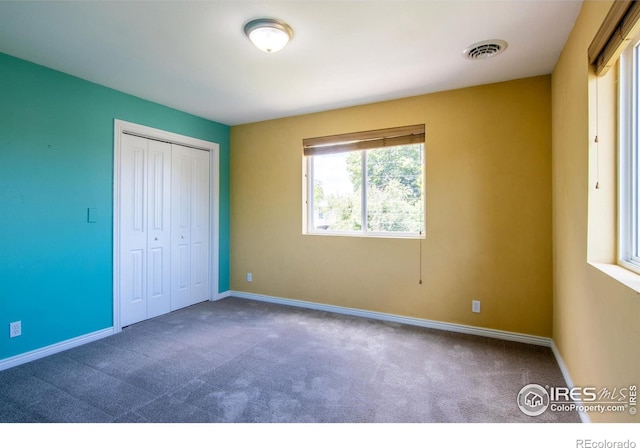 403 W Cannon St, Lafayette, CO 80026 - unfurnished bedroom with carpet floors and a closet