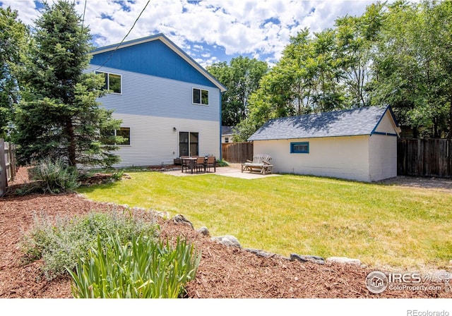 403 W Cannon St, Lafayette, CO 80026 - rear view of house with a patio