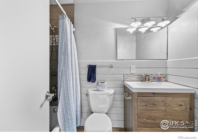 6864 Balsam St, Arvada, CO 80004 - bathroom featuring vanity and shower / bathtub combination with curtain