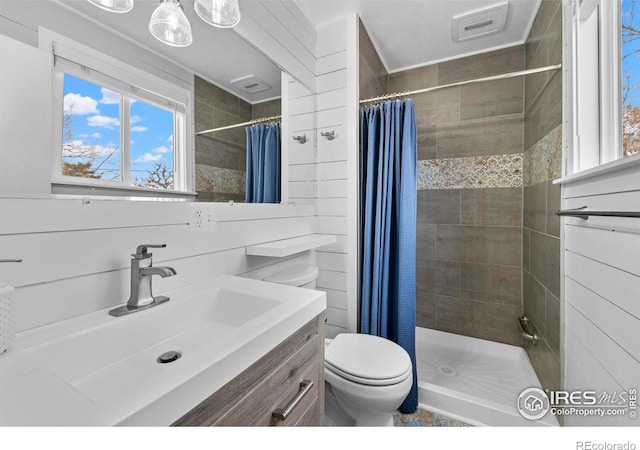 6864 Balsam St, Arvada, CO 80004 - bathroom with vanity and tiled shower