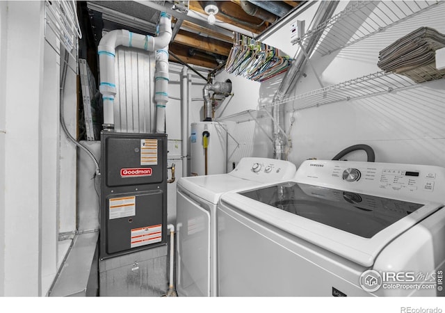 6864 Balsam St, Arvada, CO 80004 - washroom featuring washing machine and clothes dryer and water heater