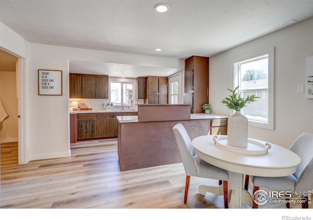 1343 E 7th St Unit 1, Loveland, CO 80537 - dining space with light wood-style flooring and recessed lighting