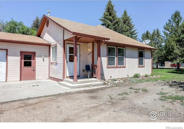 1343 E 7th St Unit 1, Loveland, CO 80537 - view of front facade featuring roof with shingles