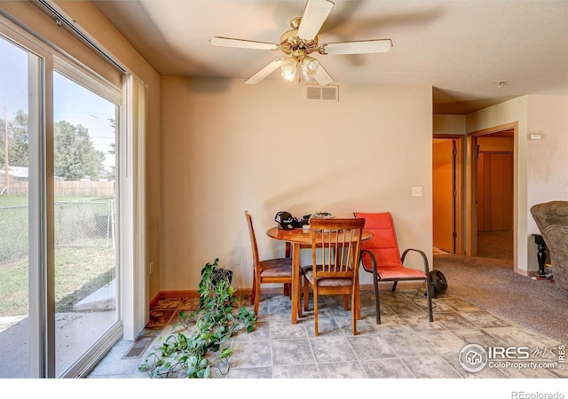 1343 E 7th St Unit 1, Loveland, CO 80537 - dining space with ceiling fan and baseboards