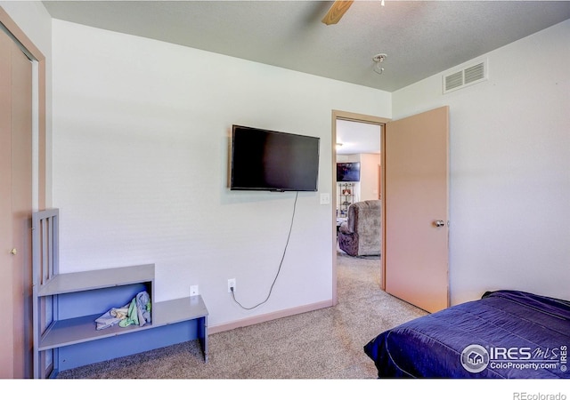 1343 E 7th St Unit 1, Loveland, CO 80537 - carpeted bedroom with a ceiling fan