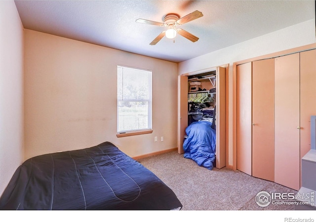 1343 E 7th St Unit 1, Loveland, CO 80537 - carpeted bedroom featuring multiple closets and ceiling fan