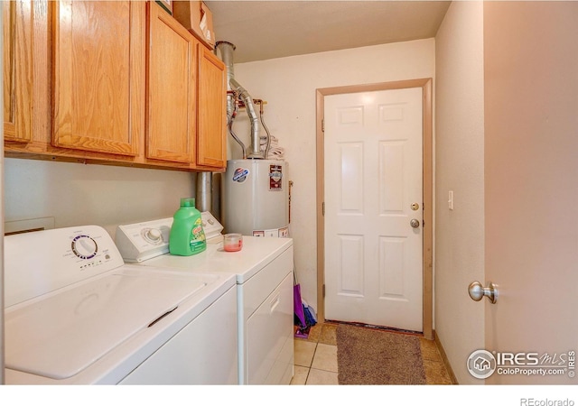 1343 E 7th St Unit 1, Loveland, CO 80537 - laundry area with water heater, separate washer and dryer, cabinet space, and light tile patterned floors