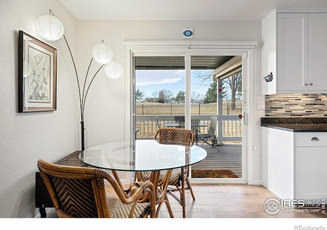 5072 Saint Andrews Dr, Loveland, CO 80537 - dining space featuring light wood-style floors