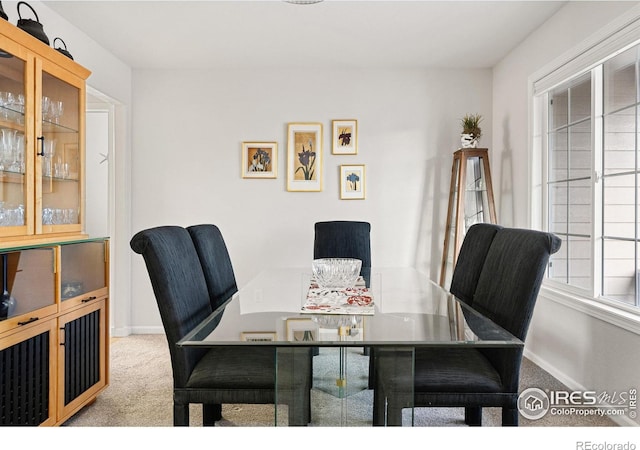 5072 Saint Andrews Dr, Loveland, CO 80537 - carpeted dining area with baseboards