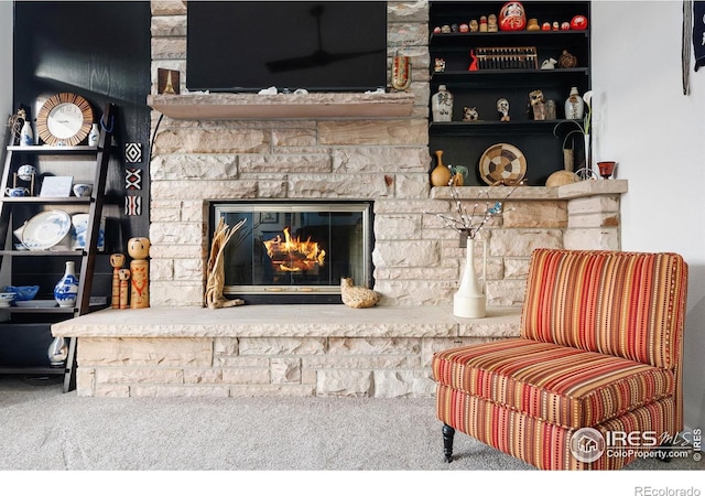 5072 Saint Andrews Dr, Loveland, CO 80537 - living area featuring carpet floors and a fireplace