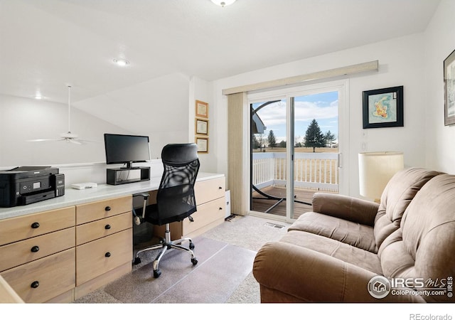 5072 Saint Andrews Dr, Loveland, CO 80537 - office space with light carpet, built in study area, a ceiling fan, and vaulted ceiling