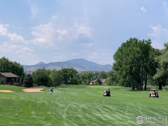 5072 Saint Andrews Dr, Loveland, CO 80537 - view of property's community featuring a mountain view, golf course view, and a yard