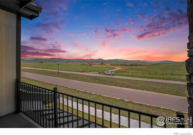 1550 Harebell St, Berthoud, CO 80513 - balcony at dusk with a mountain view