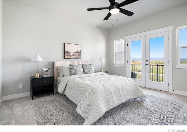 1550 Harebell St, Berthoud, CO 80513 - bedroom with french doors, carpet flooring, access to exterior, and multiple windows