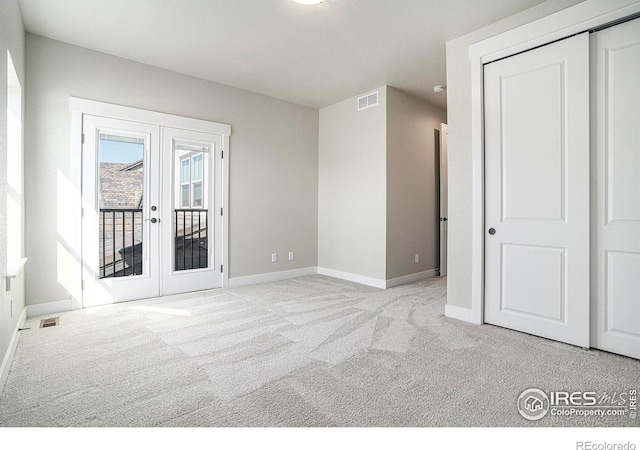 1550 Harebell St, Berthoud, CO 80513 - carpeted spare room with french doors and baseboards