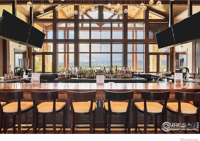 1550 Harebell St, Berthoud, CO 80513 - community bar area with wooden ceiling and high vaulted ceiling