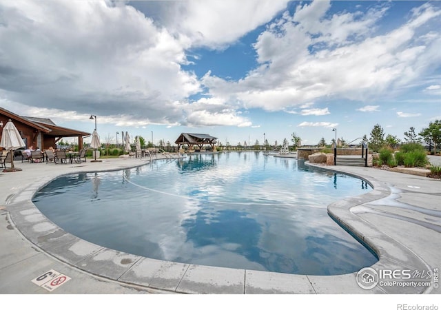 1550 Harebell St, Berthoud, CO 80513 - community pool featuring a patio