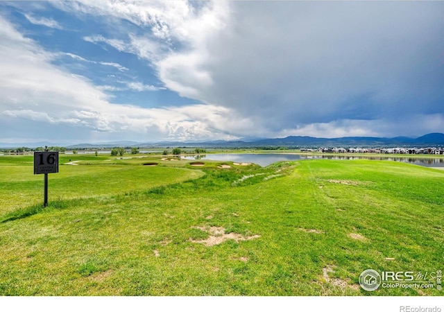 1550 Harebell St, Berthoud, CO 80513 - view of grassy yard featuring a water view