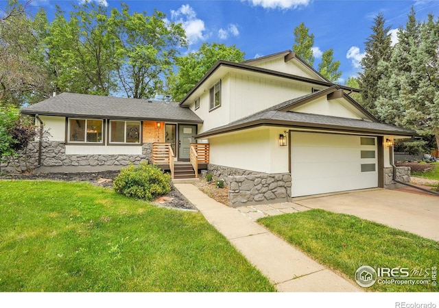 7146 Petursdale Ct, Boulder, CO 80301 - split level home with stone siding, driveway, an attached garage, a front lawn, and a shingled roof