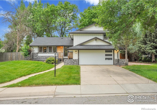 7146 Petursdale Ct, Boulder, CO 80301 - view of front of property with stone siding, driveway, an attached garage, and roof with shingles