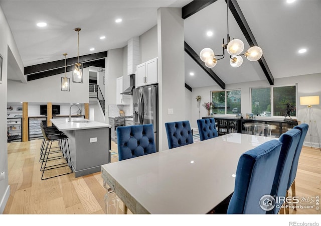 7146 Petursdale Ct, Boulder, CO 80301 - dining room with light wood-type flooring, a chandelier, and recessed lighting
