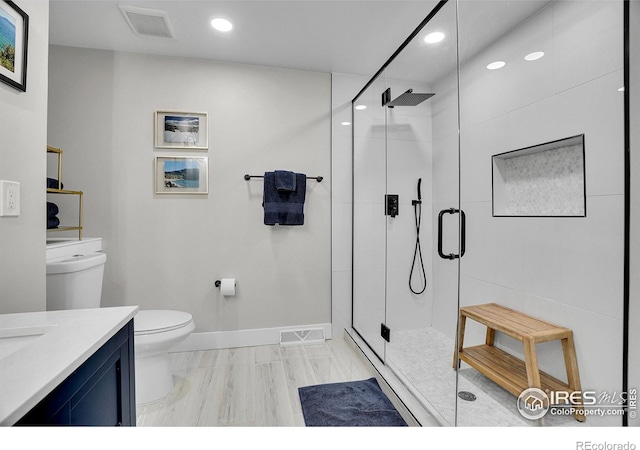 7146 Petursdale Ct, Boulder, CO 80301 - bathroom featuring recessed lighting, a shower stall, and vanity