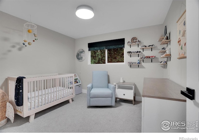 7146 Petursdale Ct, Boulder, CO 80301 - carpeted bedroom featuring a nursery area and baseboards