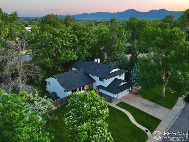 7146 Petursdale Ct, Boulder, CO 80301 - aerial view at dusk of a mountain view