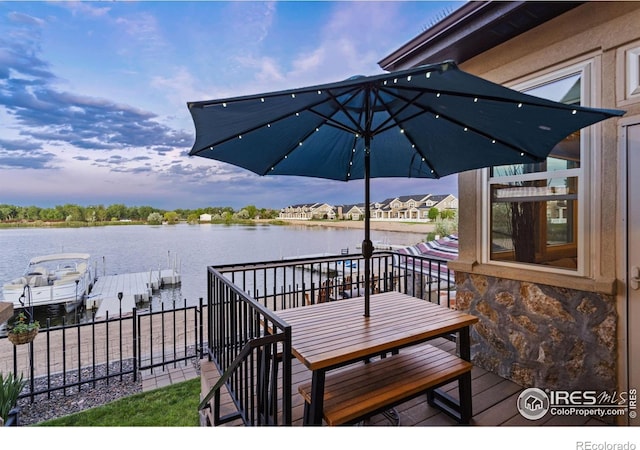 2055 Vineyard Dr, Windsor, CO 80550 - wooden deck with a water view and a dock