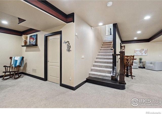 2055 Vineyard Dr, Windsor, CO 80550 - stairway with carpet, crown molding, and recessed lighting
