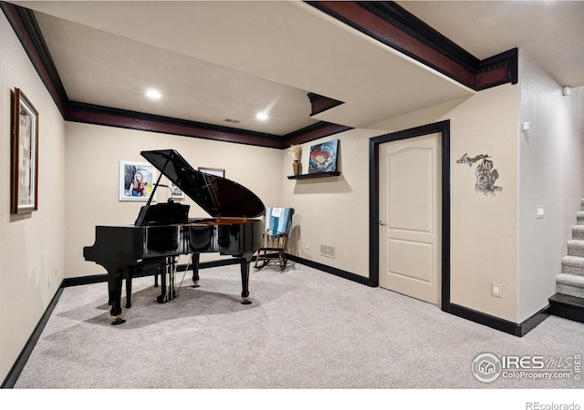 2055 Vineyard Dr, Windsor, CO 80550 - living area with carpet, crown molding, stairs, and recessed lighting
